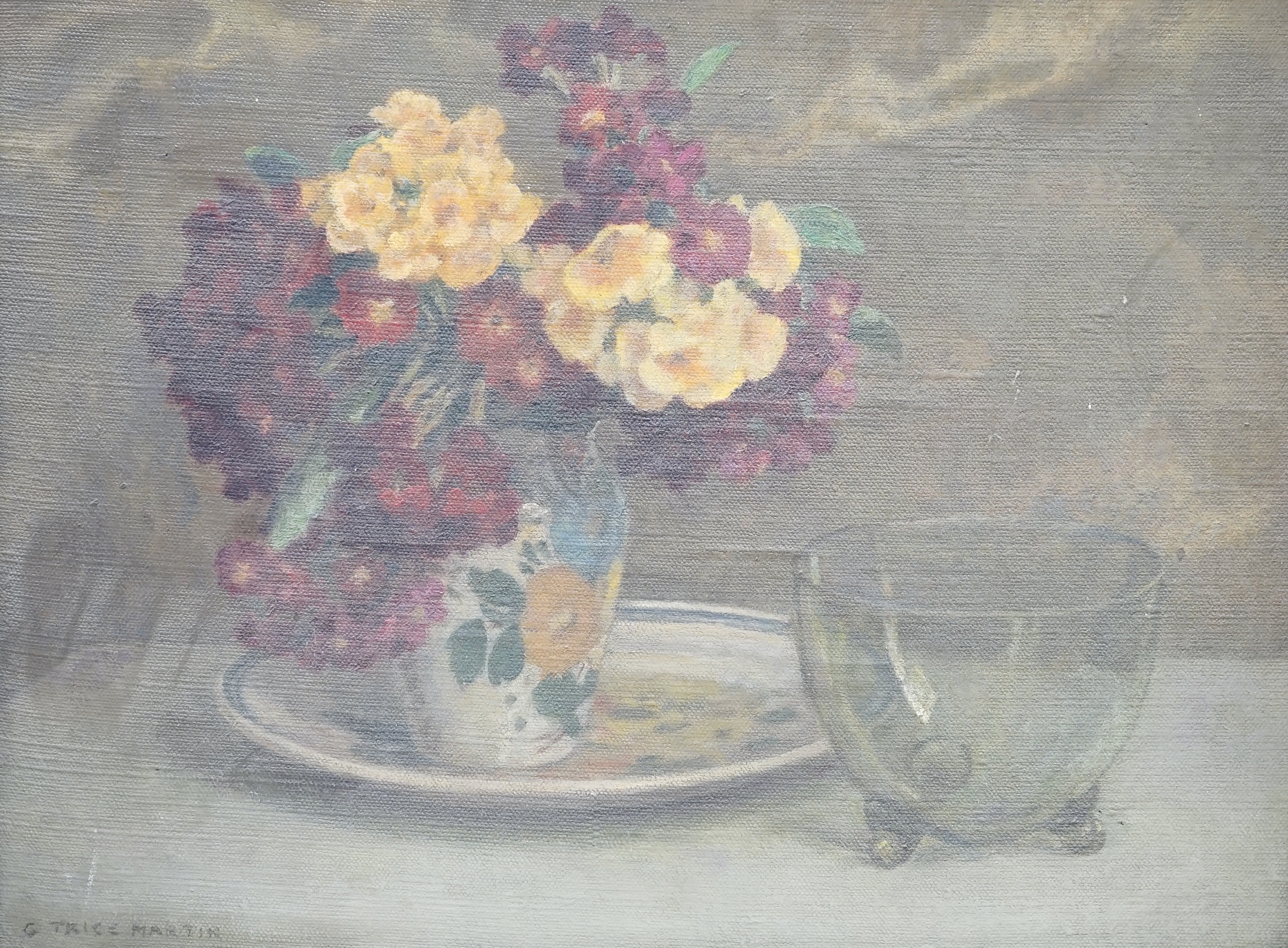 Gerald Trice Martin (1893-1961), oil on canvas, Still life of primroses in a vase and a glass bowl, signed, 31 x 41cm